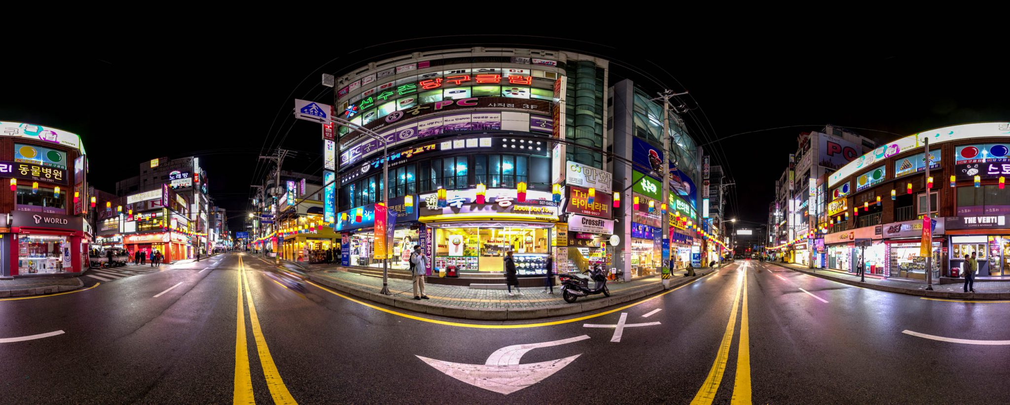 South Korea Pano HDRI 360 photo from the middle of a street lined with shops with brightly coloured signs and advertisments in South Korea.