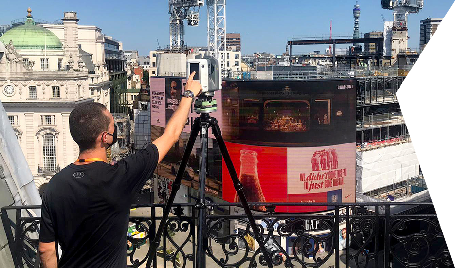 Lidar Scanning in Piccadilly Circus Clear Angle Studios crew member Lidar Scanning in Piccadilly Circus, London with a Leica RTC 360